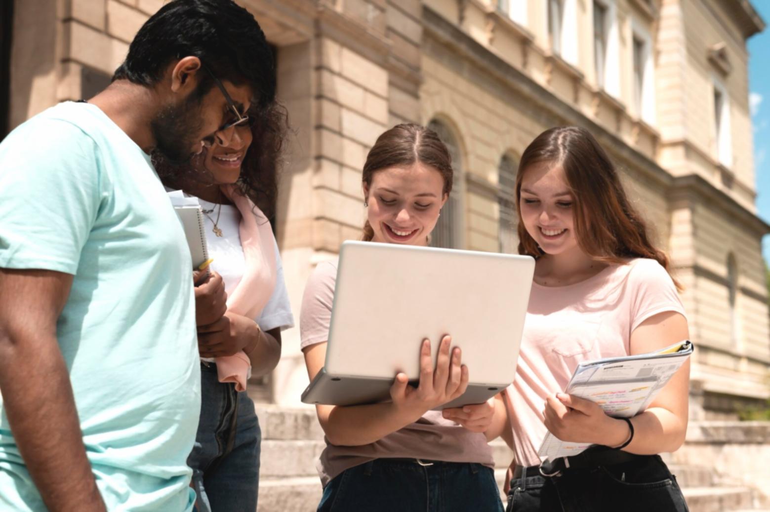 Students working through behavioral finance exercises in interactive workshop setting