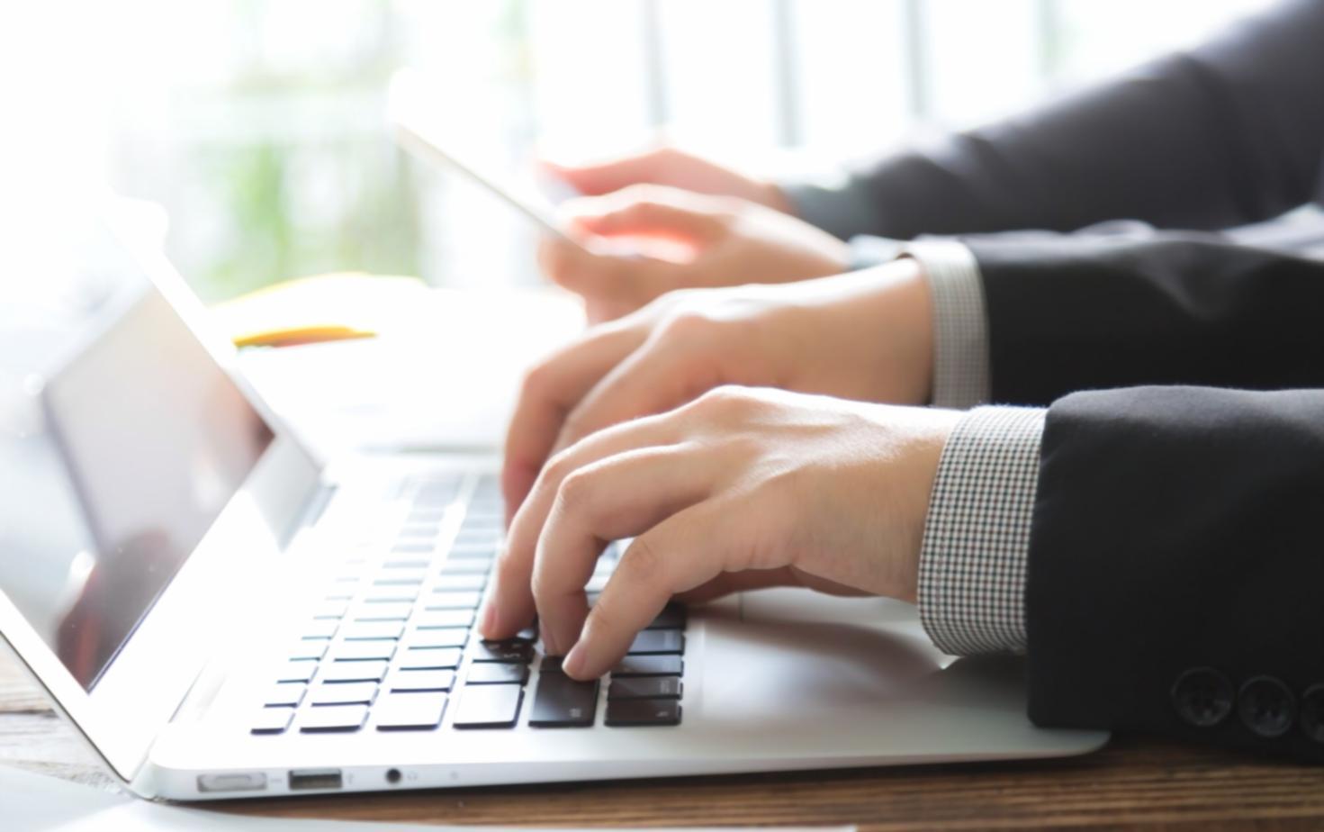 Interactive investment workshop session with participants analyzing market data